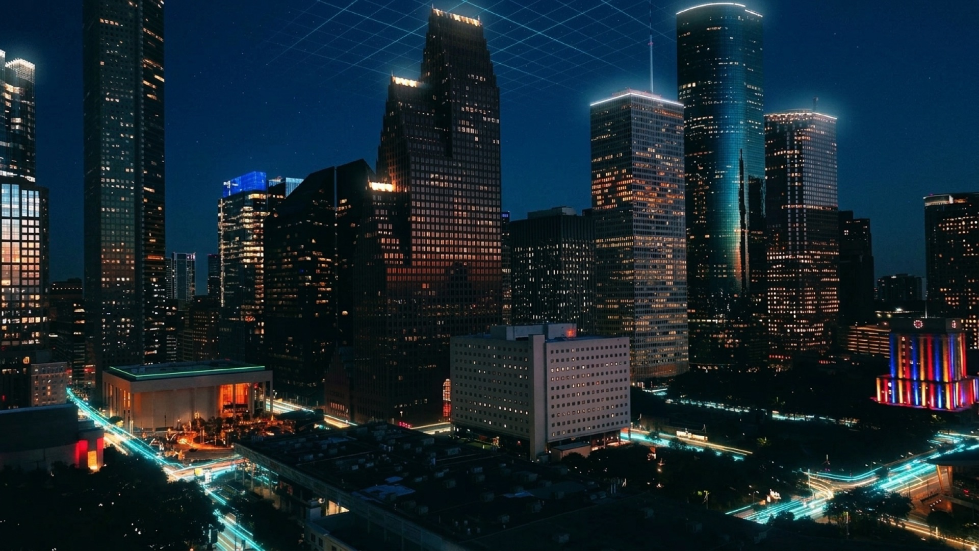 Downtown Houston at dusk, its streets lit for the night shift