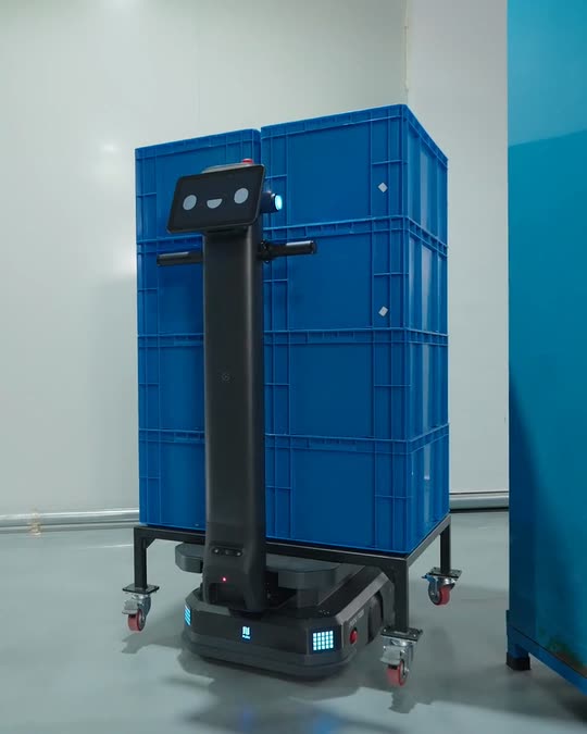 Pudu T600 robot carrying a stack of blue crates